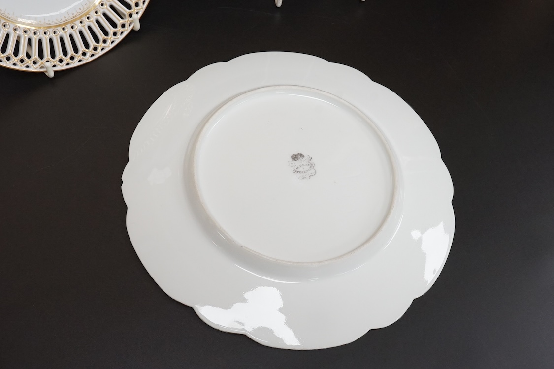 A Meissen plate, a Zsolnay box and cover, and two continental plates, largest 24cm in diameter